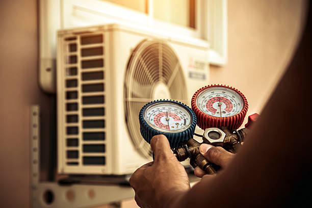 Professional Ac Installation technician working in Otterbein, IN
